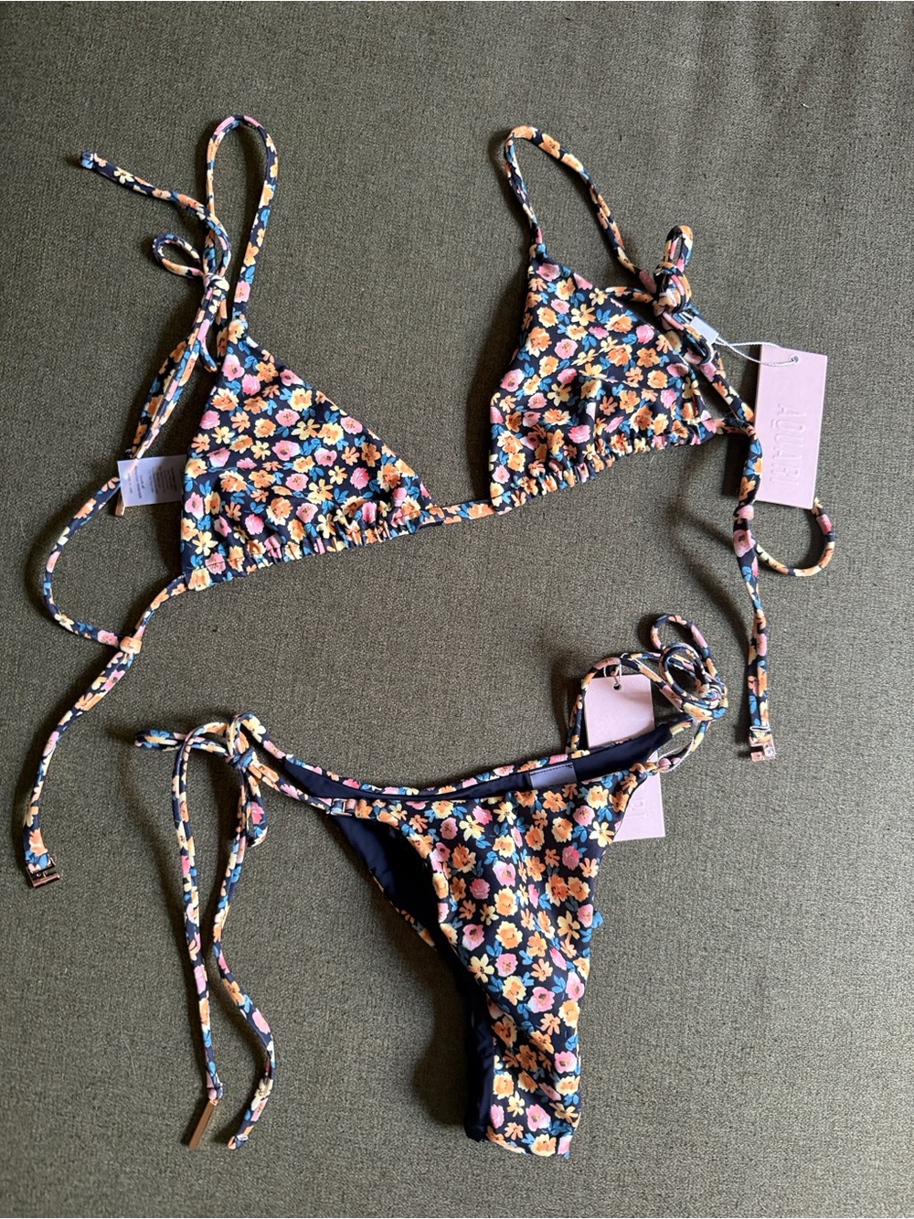AQUA Floral Tie-Side Bikini Bottom in Navy with Multi-Color Blossom Print